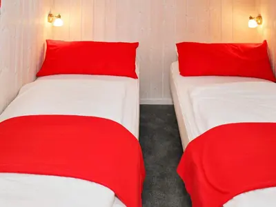 Ein Bett oder Betten in einem Zimmer der Unterkunft Waterfront holiday home in Otterndorf