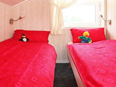 Ein Bett oder Betten in einem Zimmer der Unterkunft Waterfront holiday home in Otterndorf