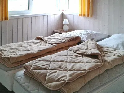 Ein Bett oder Betten in einem Zimmer der Unterkunft 6 person holiday home in Otterndorf