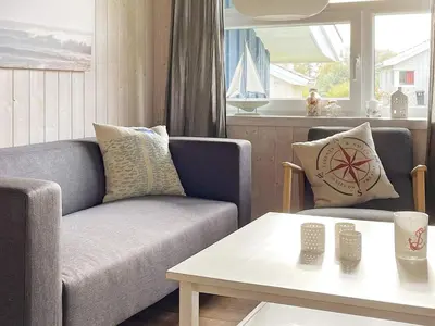 Ein Sitzbereich in der Unterkunft 6 person holiday home in Otterndorf