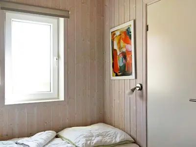 Ein Bett oder Betten in einem Zimmer der Unterkunft 6 person holiday home in Otterndorf