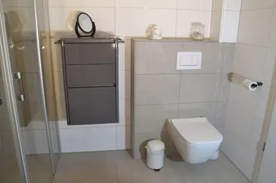 Ein Badezimmer in der Unterkunft Meeresleuchten Duhnen-Entrée 8