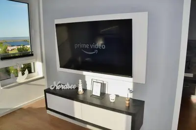 TV/Unterhaltungsangebot in der Unterkunft Meeresleuchten Duhnen-Entrée 8