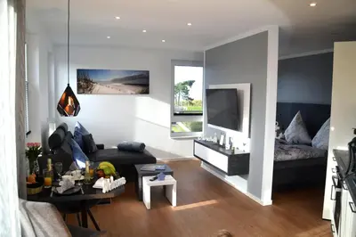 Ein Sitzbereich in der Unterkunft Meeresleuchten Duhner Entrée - 8