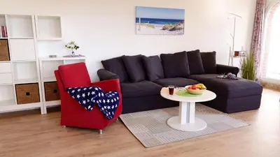 Ein Sitzbereich in der Unterkunft Haus Nordseeperle 11