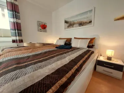 Ein Bett oder Betten in einem Zimmer der Unterkunft Sonnenstrahl Nr5