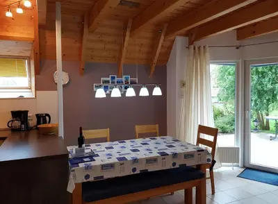 Ein Bett oder Betten in einem Zimmer der Unterkunft Ferienhaus Juna am Nordseedeich
