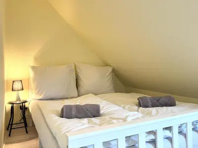 Ein Bett oder Betten in einem Zimmer der Unterkunft Albatros 1a