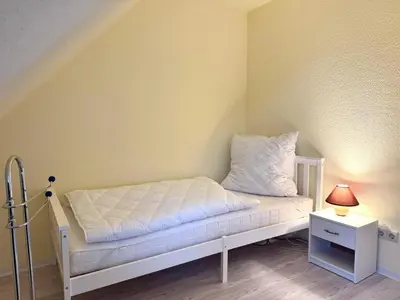 Ein Bett oder Betten in einem Zimmer der Unterkunft Albatros 1a