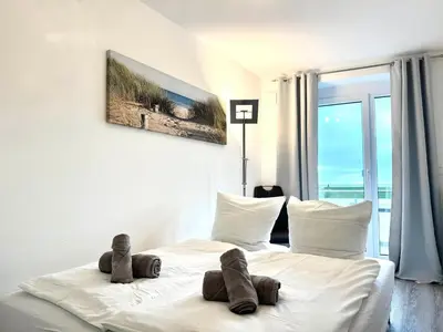 Ein Bett oder Betten in einem Zimmer der Unterkunft Penthouse de Lünk