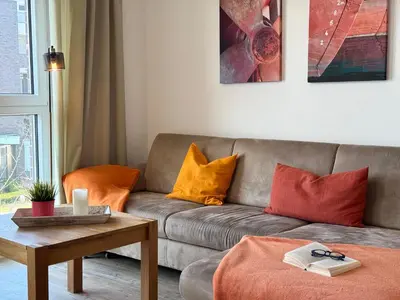 Ein Sitzbereich in der Unterkunft Ferienwohnung de Roggenbloom