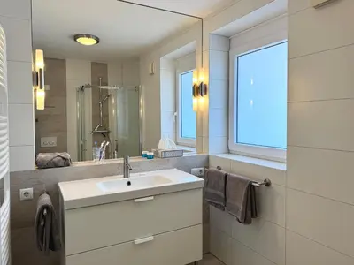 Ein Badezimmer in der Unterkunft Ferienwohnung de Roggenbloom