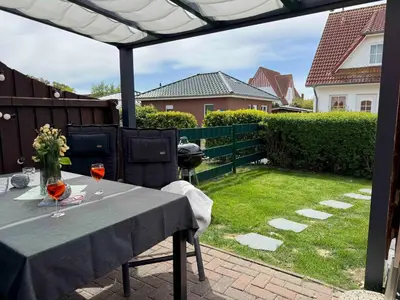 Ein Garten an der Unterkunft Haus Küstenkörbchen