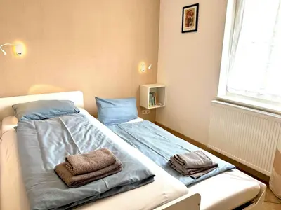 Ein Bett oder Betten in einem Zimmer der Unterkunft Villa Seestern