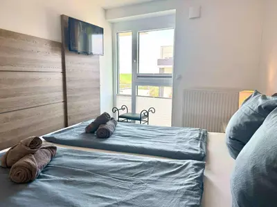 Ein Bett oder Betten in einem Zimmer der Unterkunft Ferienwohnung de Hahnpoten