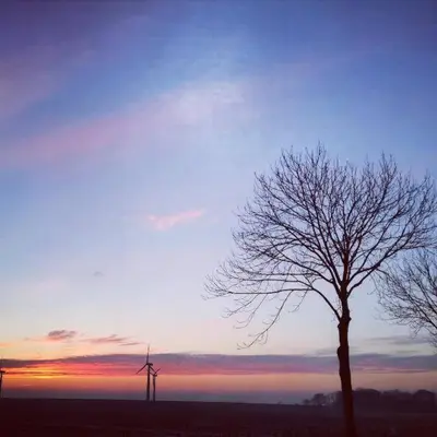 Blick auf den Sonnenuntergang/Sonnenaufgang von der Ferienwohnung aus oder aus der Nähe