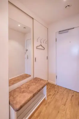 Ein Bett oder Betten in einem Zimmer der Unterkunft Hochhaus Apartment 86 MeerLounge