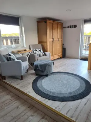 Ein Sitzbereich in der Unterkunft Ferienwohnung Schnelzer