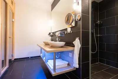 Ein Badezimmer in der Unterkunft Ferienwohnung Deichgraf Resort 27-11