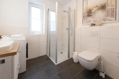 Ein Badezimmer in der Unterkunft Ferienreihenhaus 