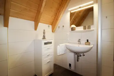 Ein Badezimmer in der Unterkunft Ferienhaus Mellumplate 17