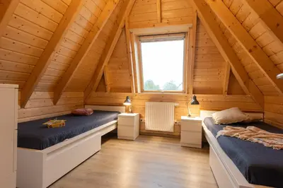Ein Bett oder Betten in einem Zimmer der Unterkunft Ferienhaus 