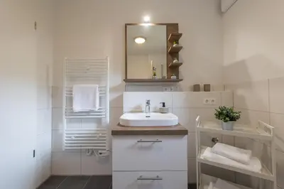 Ein Badezimmer in der Unterkunft Ferienreihenhaus 