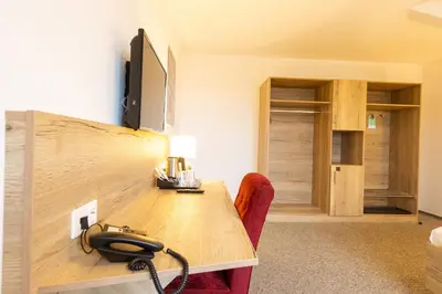 TV/Unterhaltungsangebot in der Unterkunft Cuxlandhotel Doppelzimmer 123