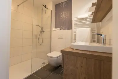 Ein Badezimmer in der Unterkunft Ferienreihenhaus 