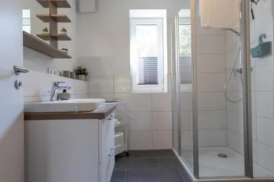 Ein Badezimmer in der Unterkunft Ferienreihenhaus 