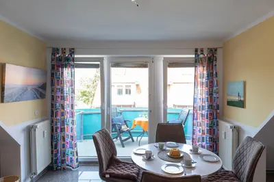 Ein Sitzbereich in der Unterkunft Appartement Sieltrift 33-32