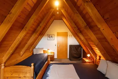 Ein Bett oder Betten in einem Zimmer der Unterkunft Ferienhaus Lale Andersen 25