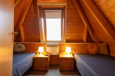 Ein Bett oder Betten in einem Zimmer der Unterkunft Ferienhaus Lale Andersen 25