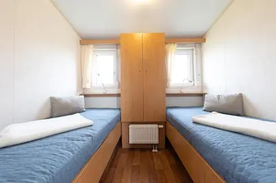 Ein Bett oder Betten in einem Zimmer der Unterkunft Ferienhaus 