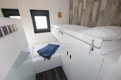 Ein Bett oder Betten in einem Zimmer der Unterkunft Hausboot 
