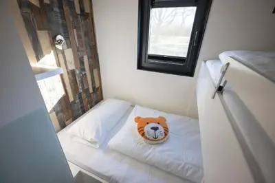 Ein Bett oder Betten in einem Zimmer der Unterkunft Hausboot 