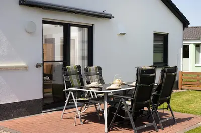 Ein Patio oder anderer Außenbereich in der Unterkunft Ferienhaus 