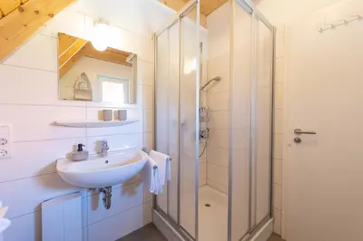 Ein Badezimmer in der Unterkunft Ferienhaus Mellumplate 37
