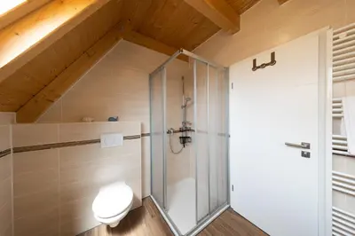 Ein Badezimmer in der Unterkunft Ferienhaus 