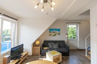 TV/Unterhaltungsangebot in der Unterkunft Appartement Sieltrift 27-25