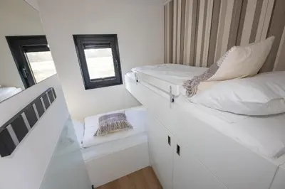 Ein Bett oder Betten in einem Zimmer der Unterkunft Hausboot 