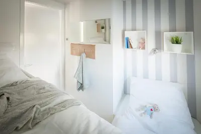 Ein Bett oder Betten in einem Zimmer der Unterkunft Hausboot 