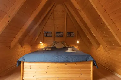 Ein Bett oder Betten in einem Zimmer der Unterkunft Ferienhaus Edi-Oehmsen 01