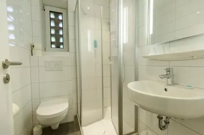 Ein Badezimmer in der Unterkunft Cuxlandhotel Doppelzimmer 116