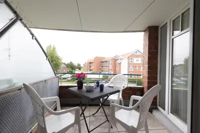 Ein Balkon oder eine Terrasse in der Unterkunft Appartement Kormoranweg 42-203