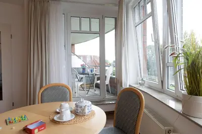 Ein Sitzbereich in der Unterkunft Appartement Kormoranweg 42-203