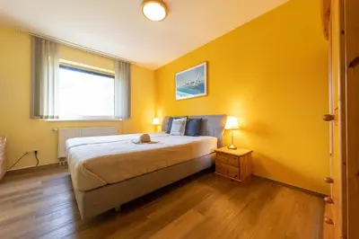 Ein Bett oder Betten in einem Zimmer der Unterkunft Ferienwohnung 