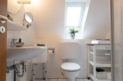 Ein Badezimmer in der Unterkunft Ferienwohnung Sieltrift 4-08