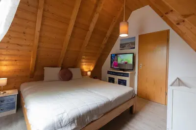 Ein Bett oder Betten in einem Zimmer der Unterkunft Ferienhaus 