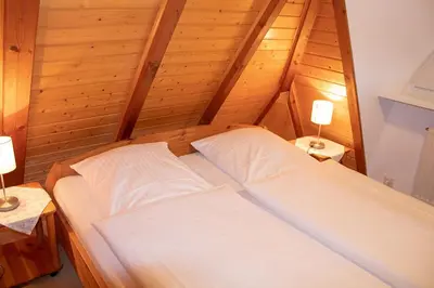 Ein Bett oder Betten in einem Zimmer der Unterkunft Appartement Achtern Diek 2-30